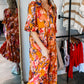 Orange Abstract Print Pleated Half Sleeve Buttoned Maxi Dress
